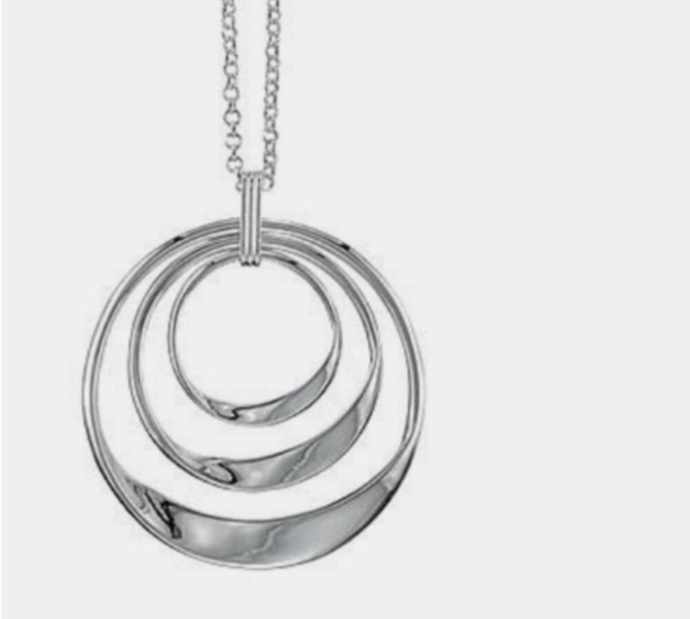 Orbit long necklace by Avon. New in the box
